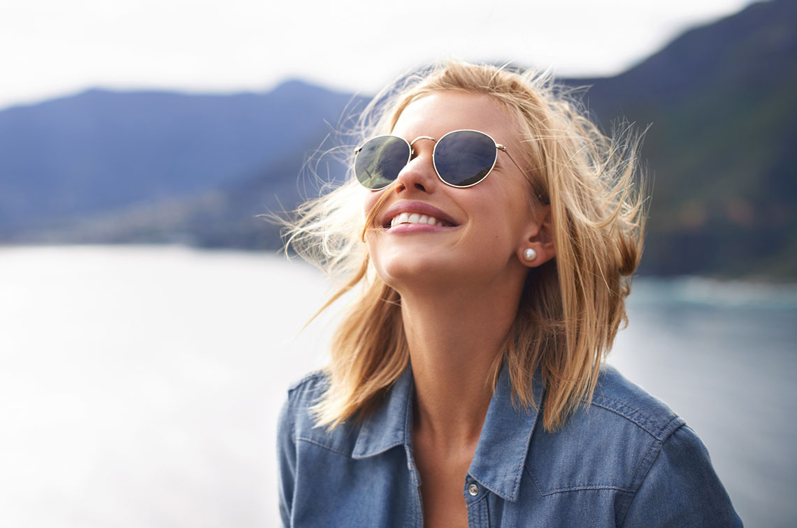 Smiling woman from Bend, OR after receiving a neck lift from Nick Vial MD.